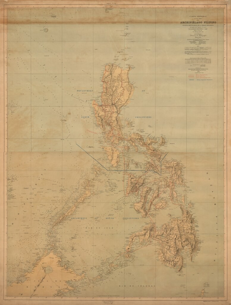 1875 map of the Philippines created by Spain showing the archipelago surrounded by the South China Sea and the Philippine Sea and Borneo. General mountainous topography and major rivers are depicted and features like cities, towns are labeled along with many land and water features. The United States republished the map in 1902 with annotations showing telegraph cable lines and the division of the archipelago into the North and South Military Department.